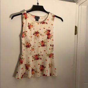 Cream colored floral peplum top